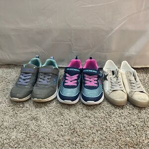 3 pairs of size 3 shoes. 2 pairs sketchers, 1 pair boutique shoes.